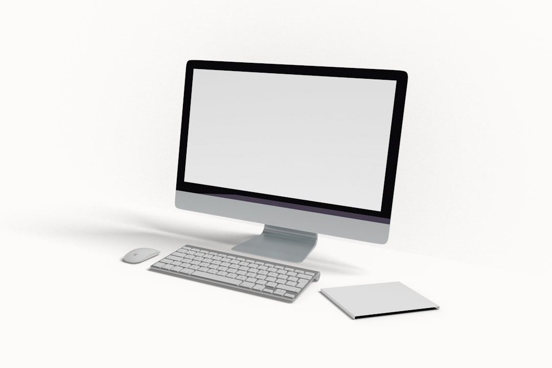 A computer monitor sitting on top of a desk